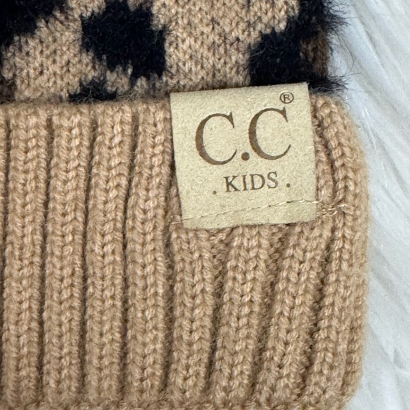 C.C Exclusives Soft Beanie Hat with Leopard Print Pattern and Faux Fur Pom - Picture 2 of 6